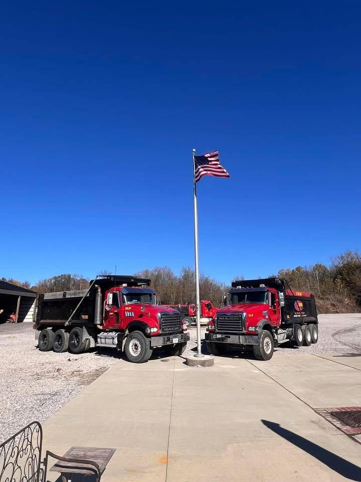 T.A. Gaddis dump trucks under the American flag