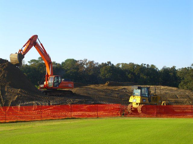 Mass grading for athletic field