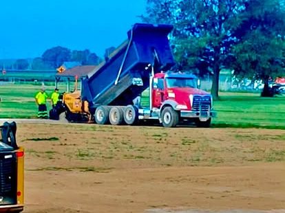 Topsoil delivery and spreading