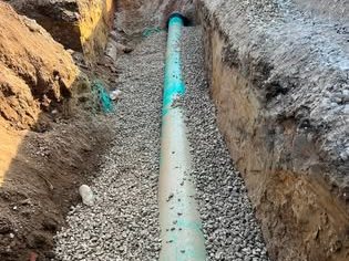 Storm sewer pipe in gravel bedding